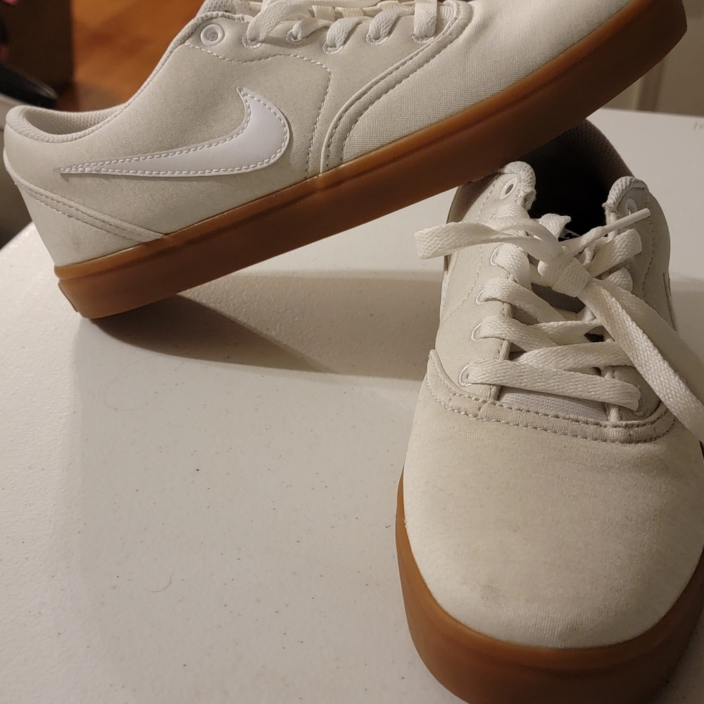 Nike shoes cream in color